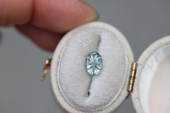 1.24ct oval icy light seafoam sapphire - Starbrite cut by John Dyer