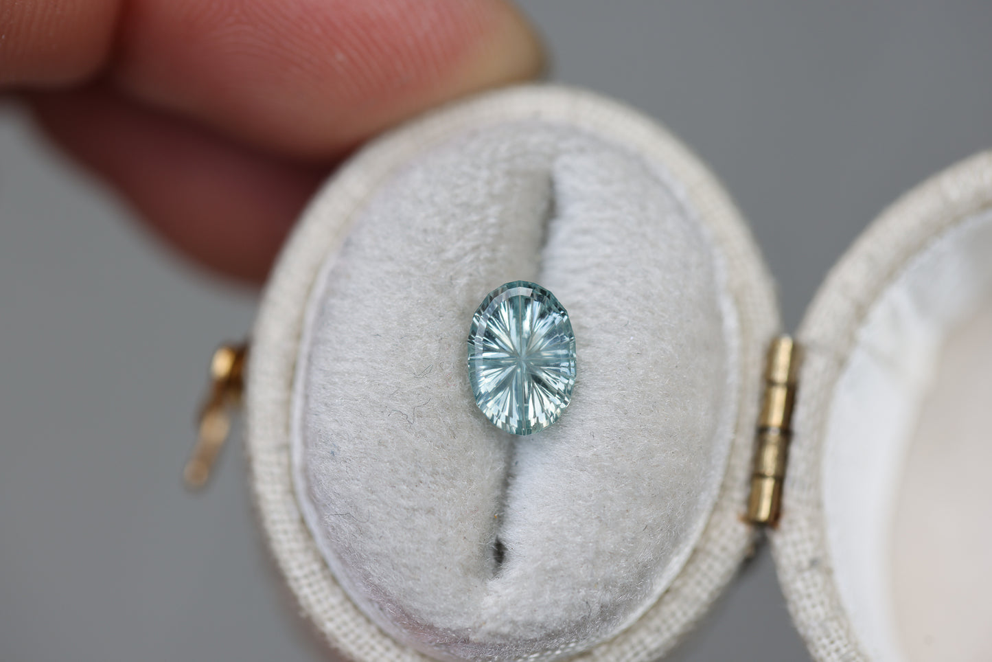 1.24ct oval icy light seafoam sapphire - Starbrite cut by John Dyer