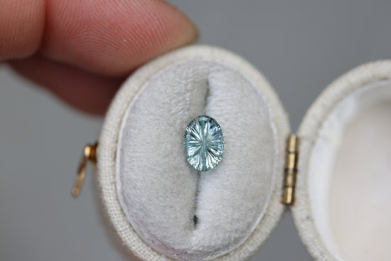 1.24ct oval icy light seafoam sapphire - Starbrite cut by John Dyer