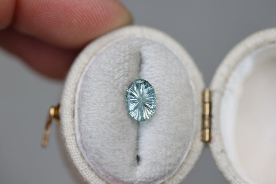 1.24ct oval icy light seafoam sapphire - Starbrite cut by John Dyer