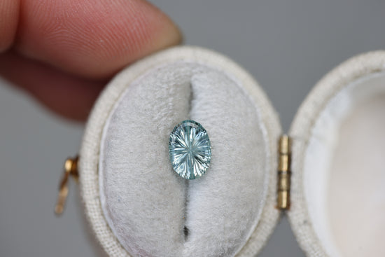 1.24ct oval icy light seafoam sapphire - Starbrite cut by John Dyer