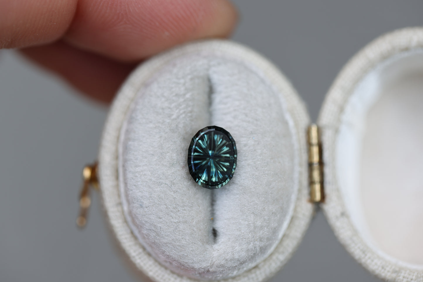 1.54ct oval deep teal green sapphire - Starbrite cut by John Dyer