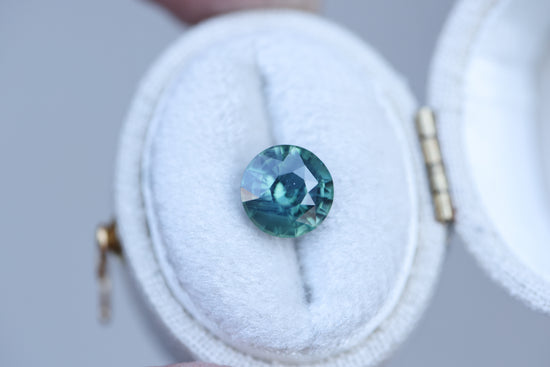 2.42ct round blue green sapphire