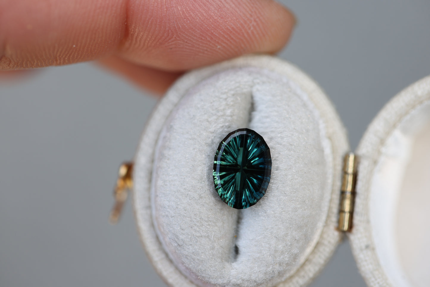 2.29ct oval deep teal green sapphire - Starbrite cut by John Dyer