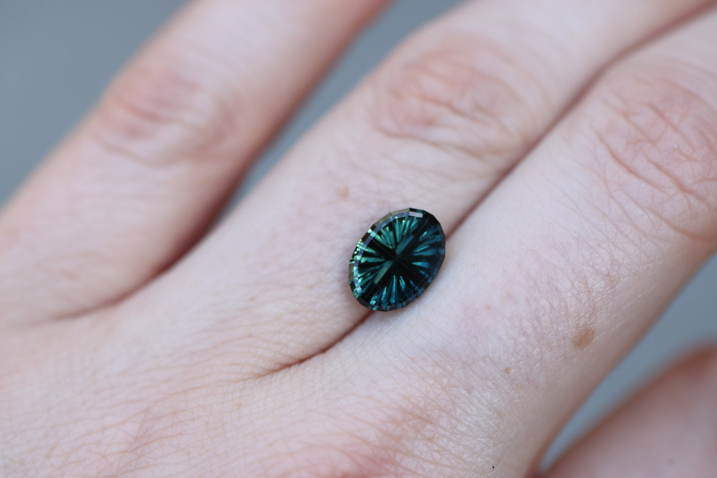 2.29ct oval deep teal green sapphire - Starbrite cut by John Dyer