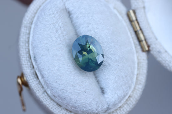 2.11ct oval opalescent teal green sapphire