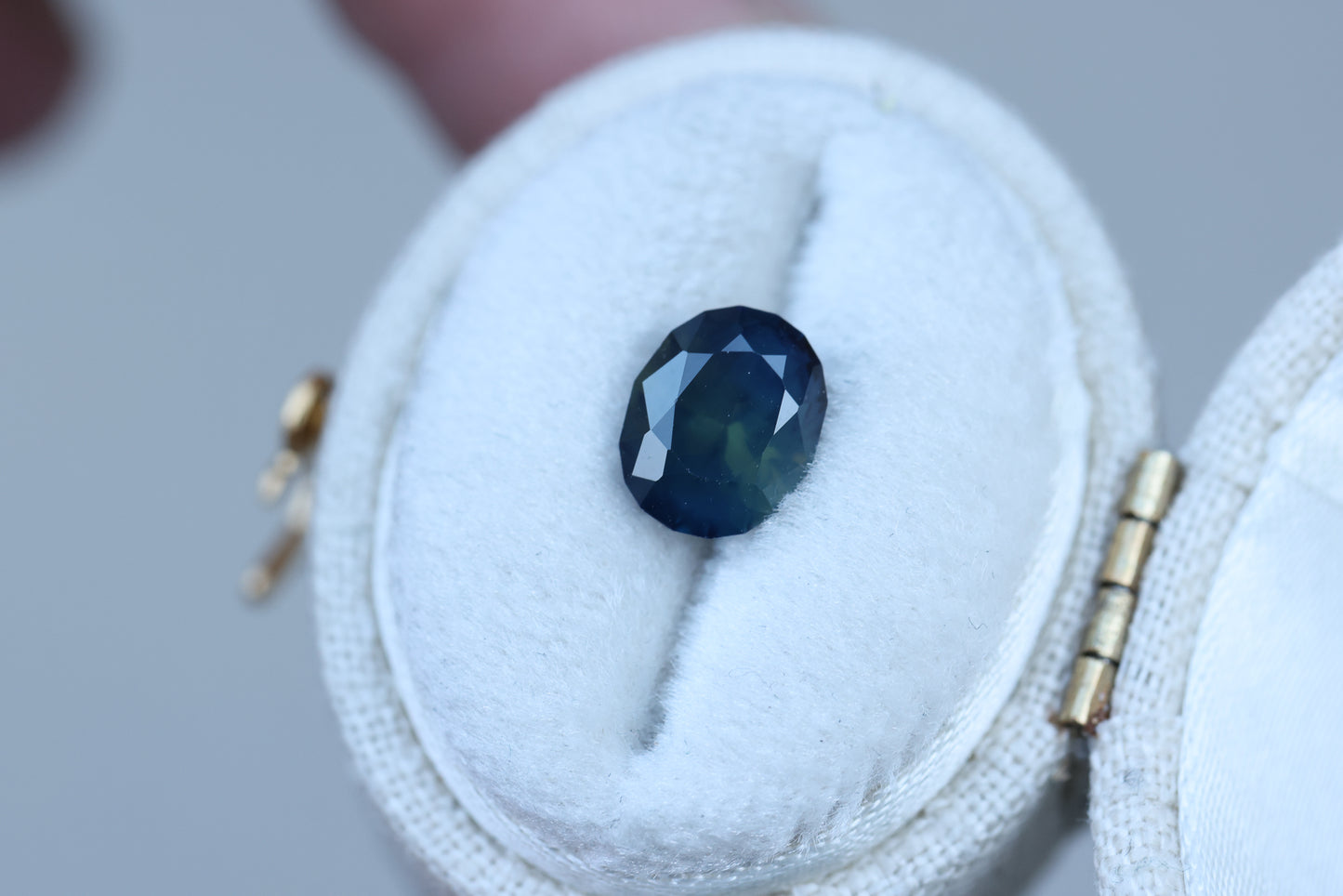 1.75ct oval deep blue teal sapphire