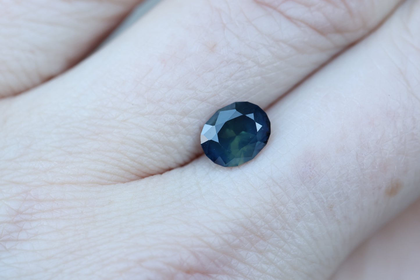 1.75ct oval deep blue teal sapphire