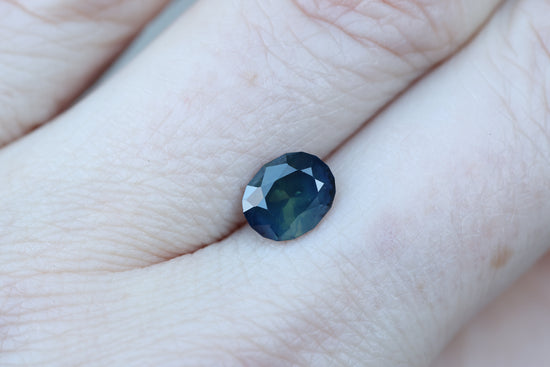 1.75ct oval deep blue teal sapphire