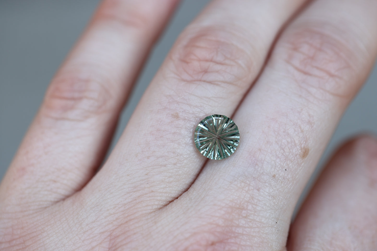 1.7ct round seafoam green sapphire - Starbrite cut by John Dyer