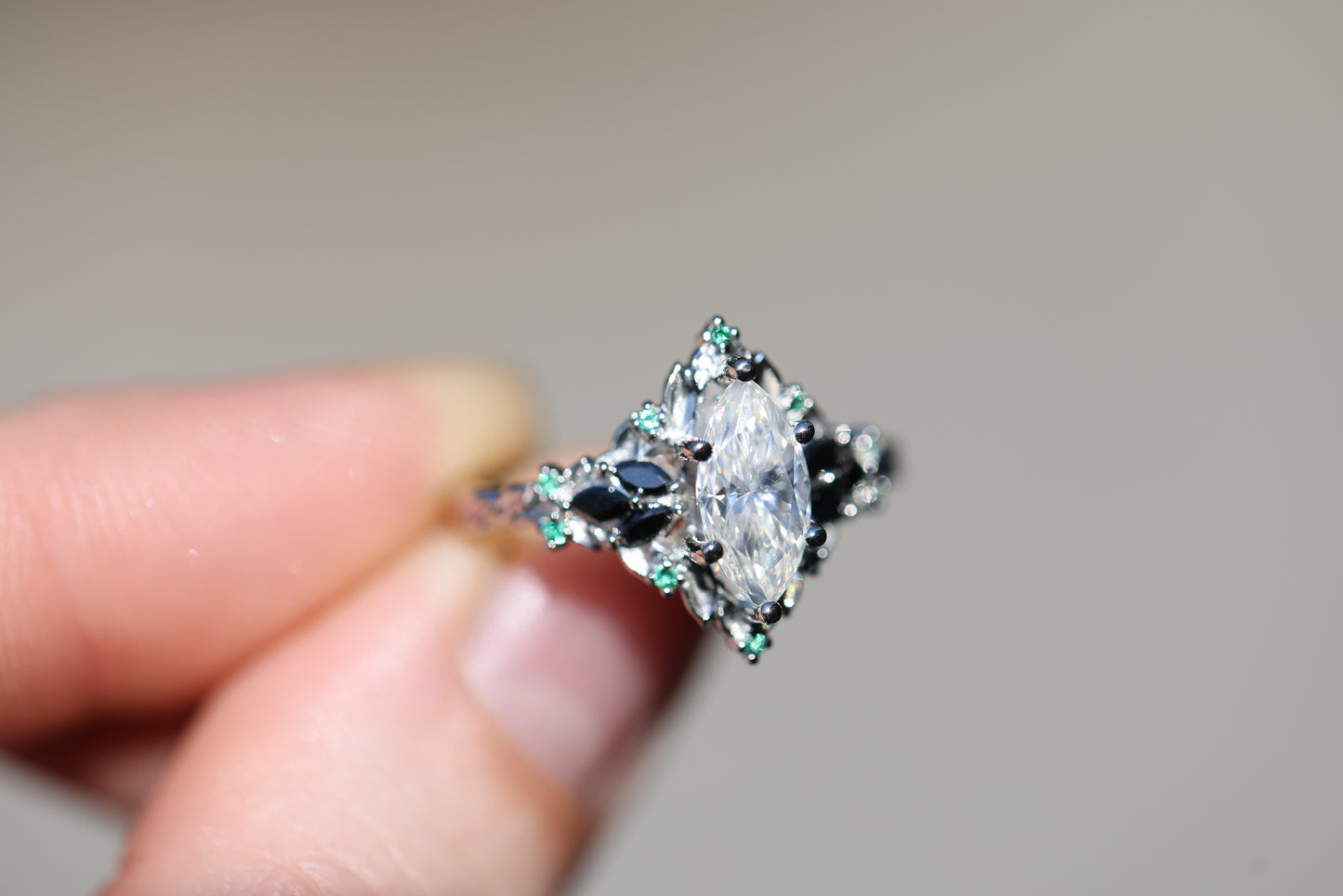 Briar Rose Starlight with 10x5mm Marquise Moissanite and Emerald Accents