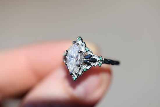 Briar Rose Starlight with 10x5mm Marquise Moissanite and Emerald Accents