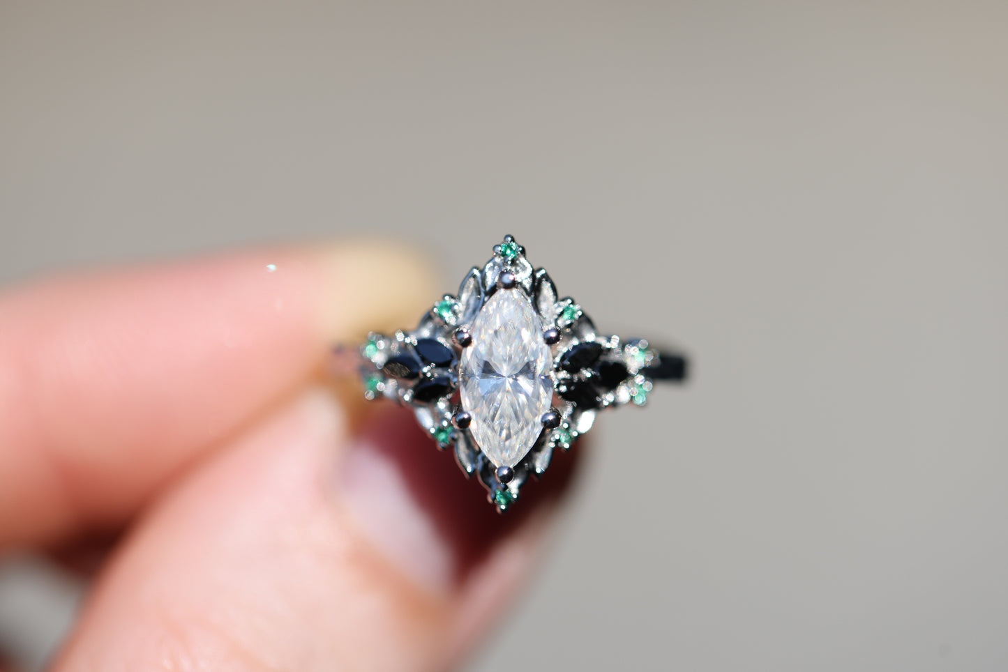 Briar Rose Starlight with 10x5mm Marquise Moissanite and Emerald Accents