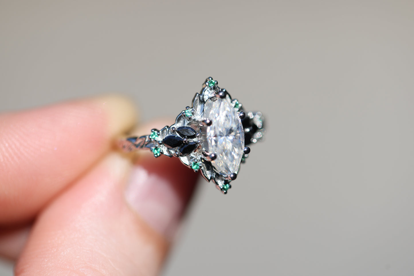 Briar Rose Starlight with 10x5mm Marquise Moissanite and Emerald Accents