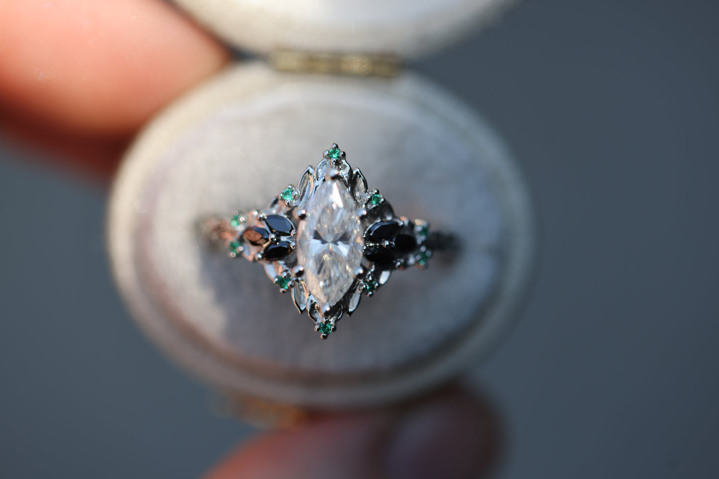 Briar Rose Starlight with 10x5mm Marquise Moissanite and Emerald Accents