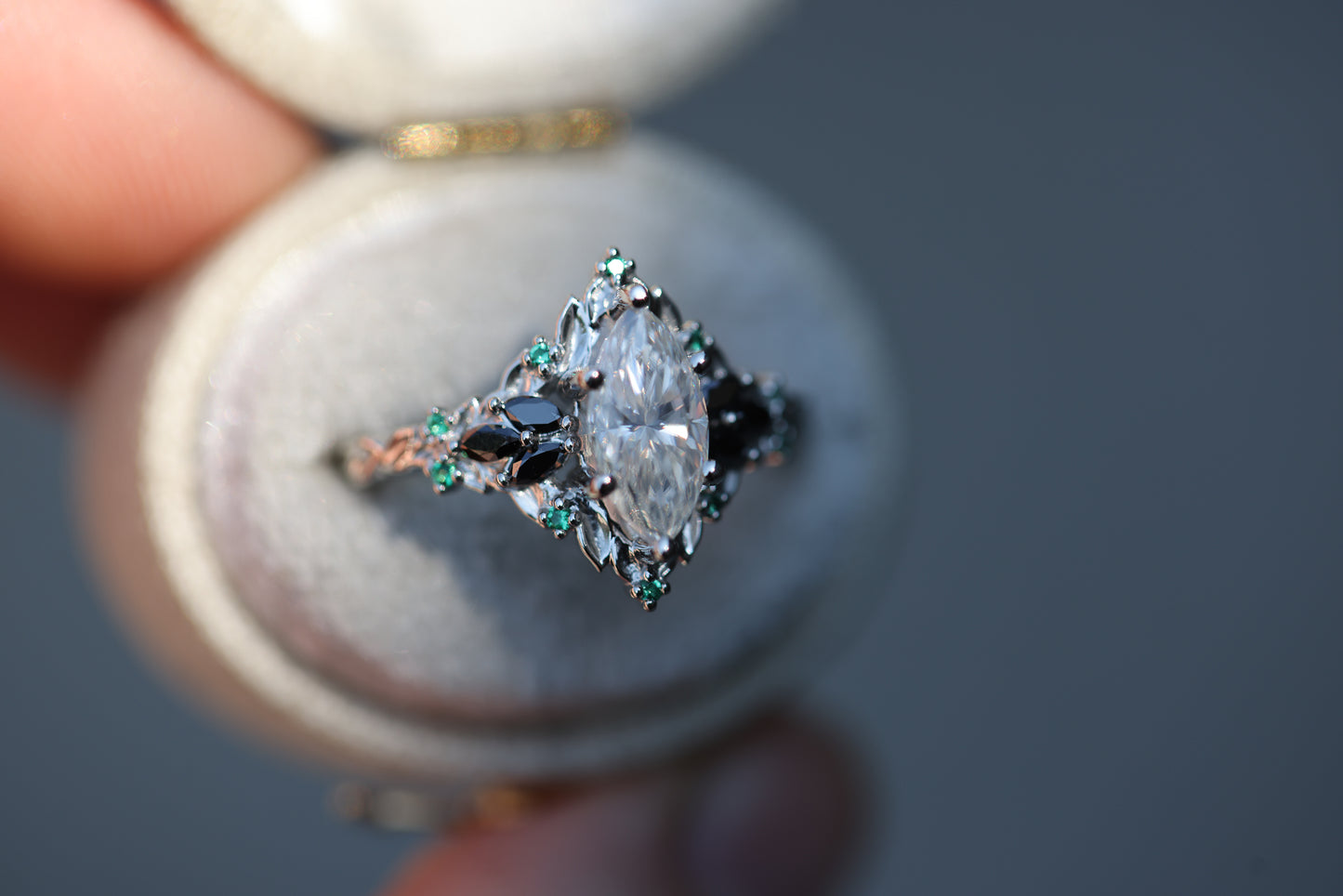 Briar Rose Starlight with 10x5mm Marquise Moissanite and Emerald Accents