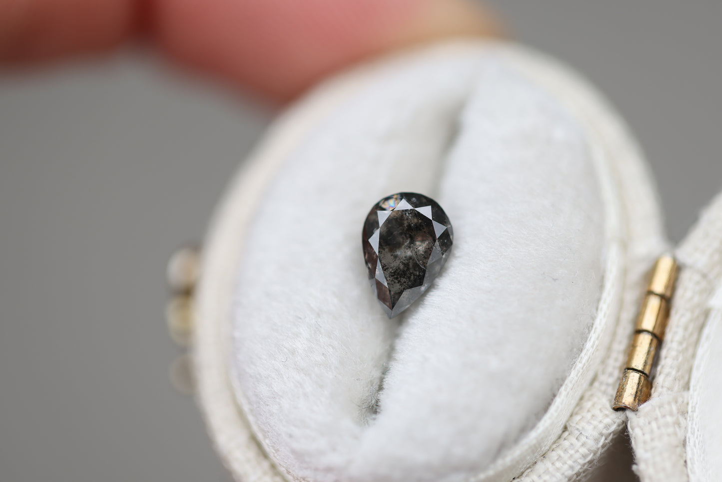 1.09ct pear dark grey salt and pepper diamond