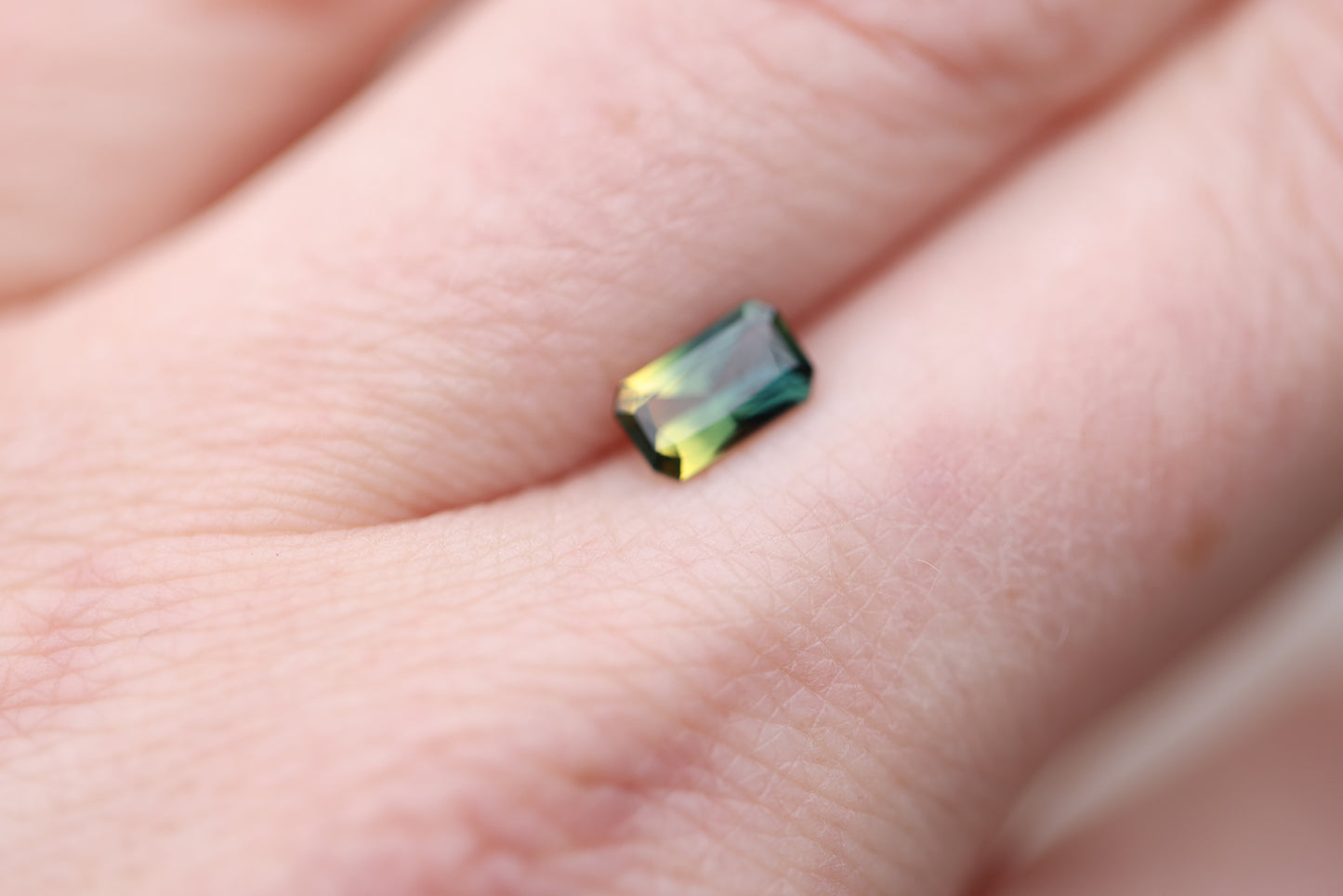.95ct emerald cut parti sapphire