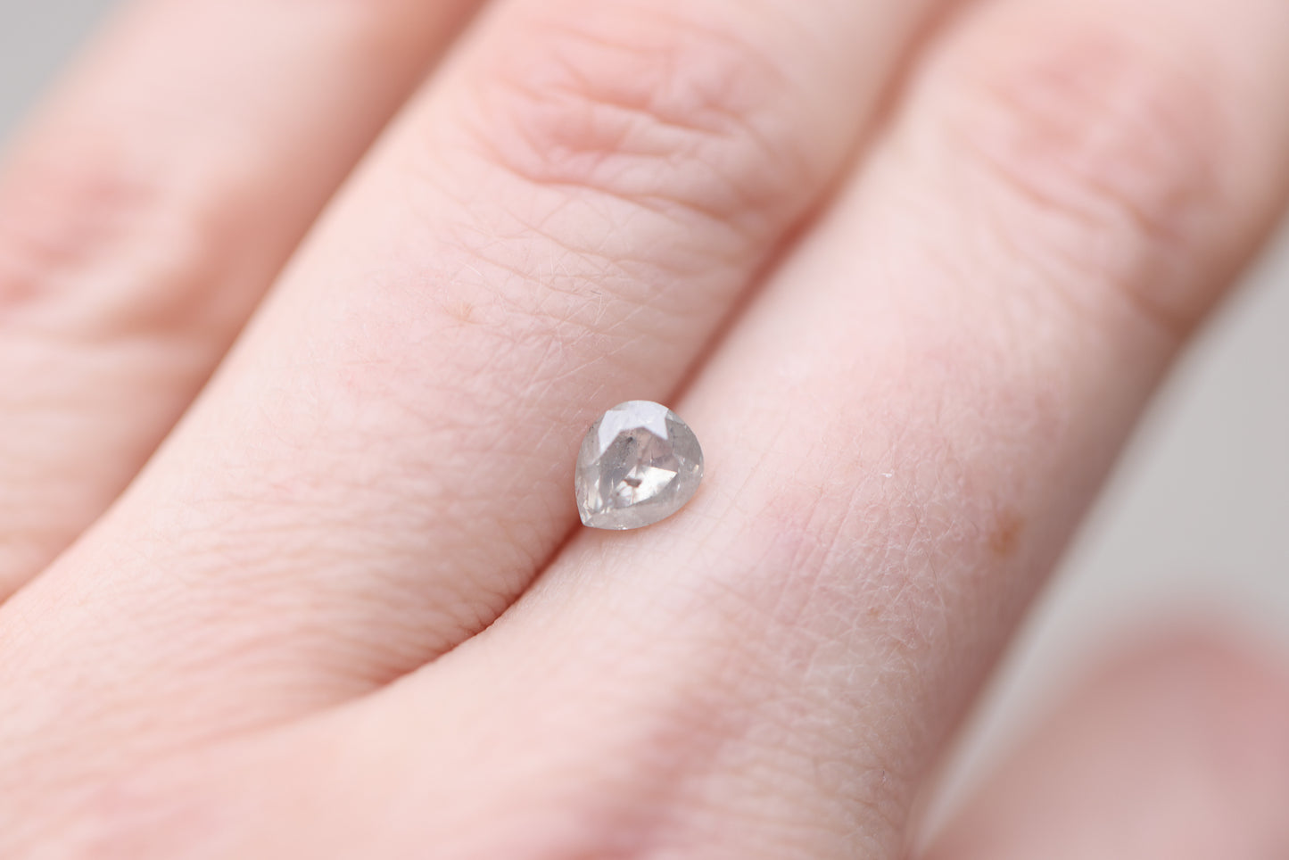 .87ct pear salt and pepper diamond