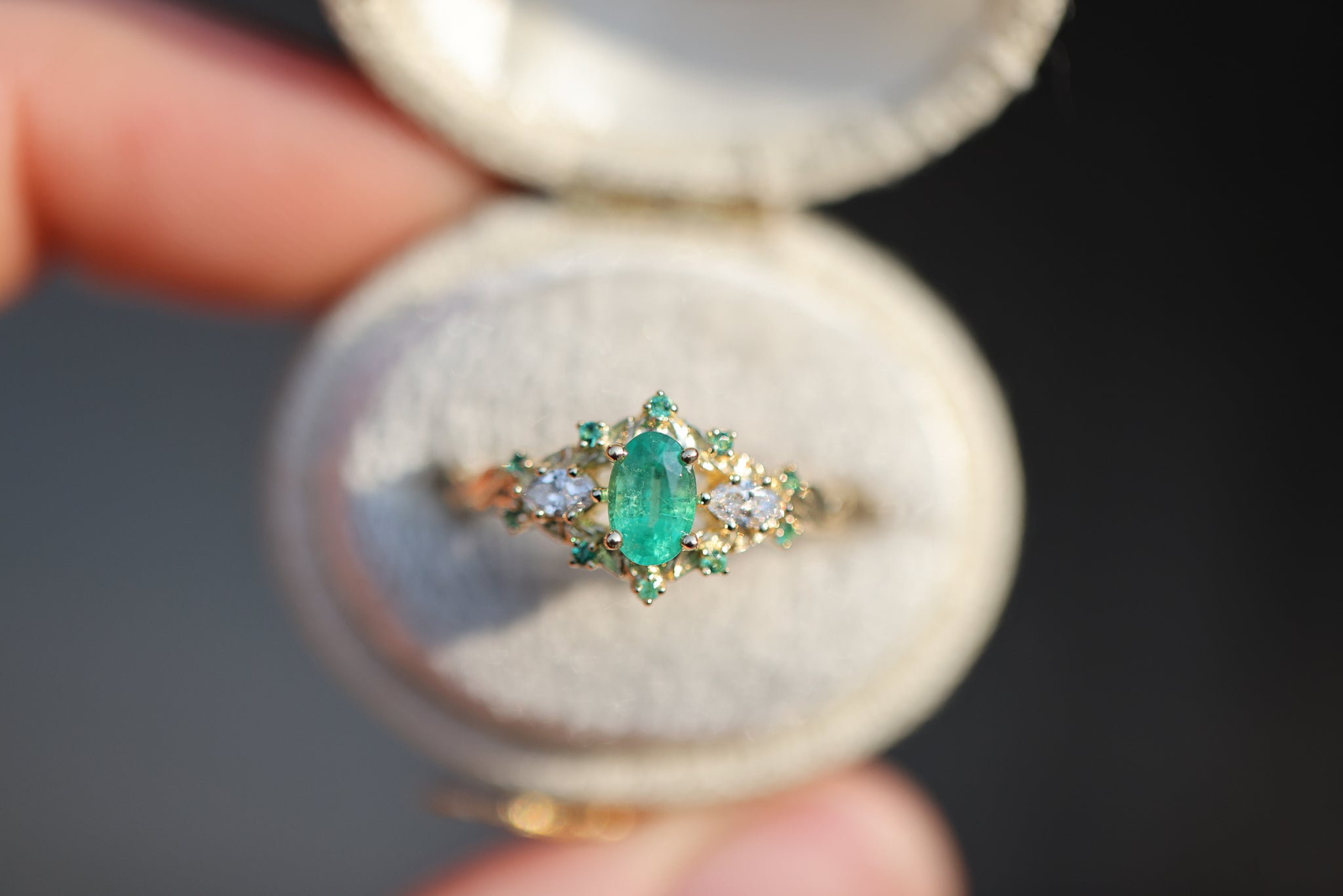 Briar Rose Three Stone with oval natural emerald and diamonds