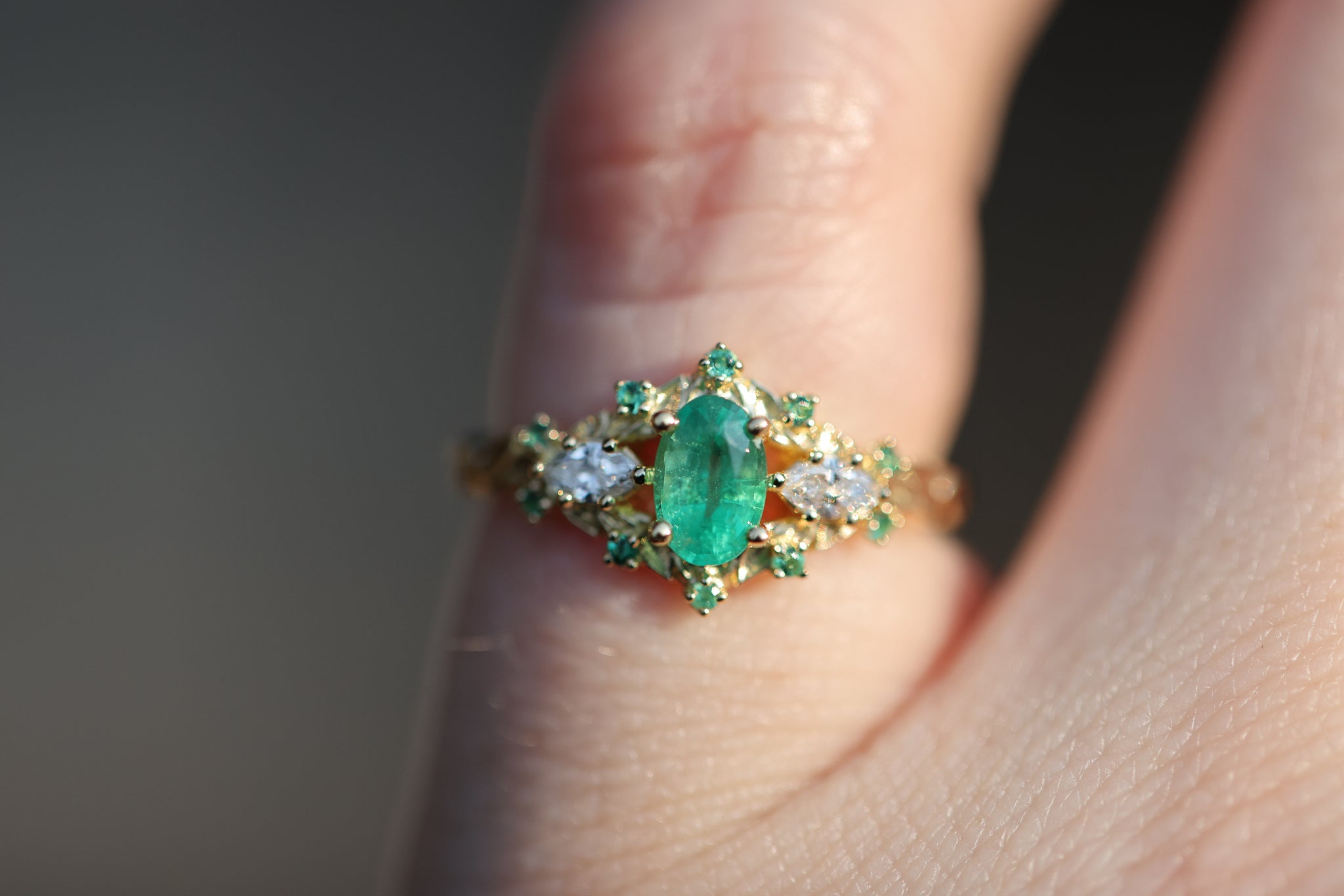 Briar Rose Three Stone with oval natural emerald and diamonds