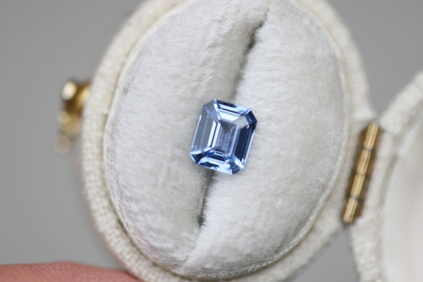 1.12ct emerald cut blue sapphire