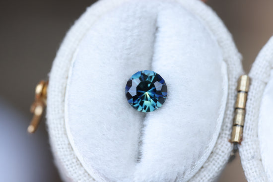 1.21ct round blue teal sapphire, Sunburst cut by John Dyer