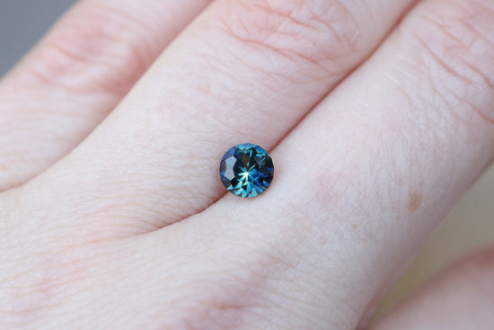 1.21ct round blue teal sapphire, Sunburst cut by John Dyer