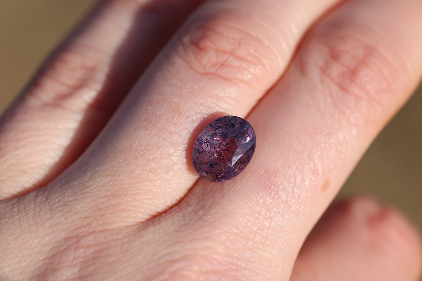 5.07ct oval galaxy purple sapphire