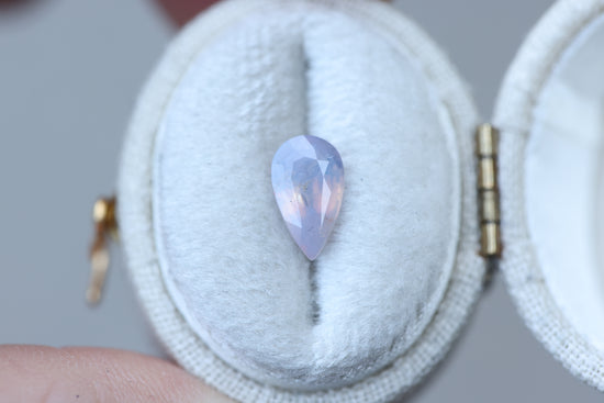 1.5ct pear opalescent light purple peachy sapphire