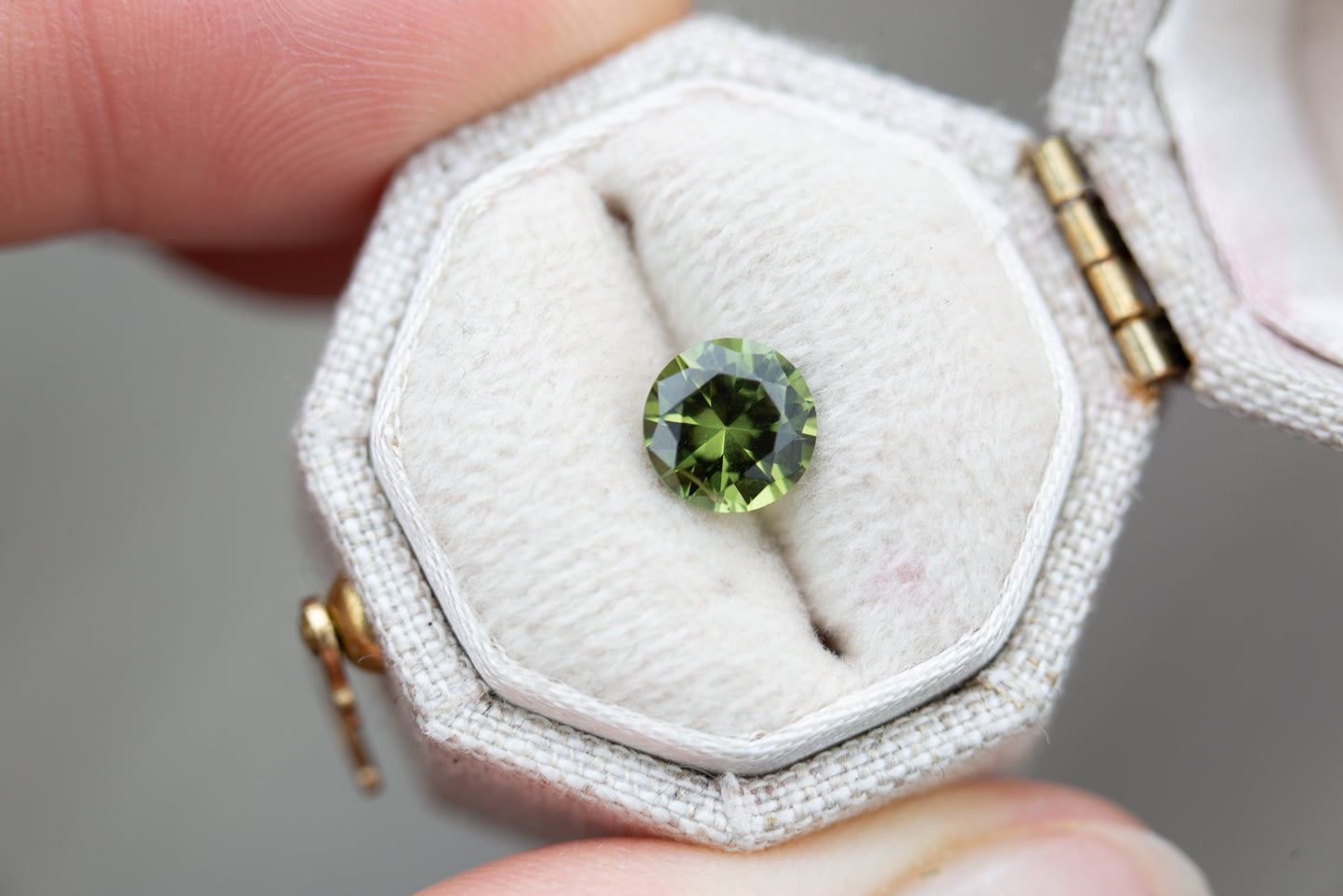 1.2ct round medium green sapphire