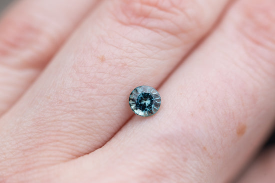 .74ct round blue green sapphire