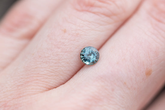 .74ct round blue green sapphire