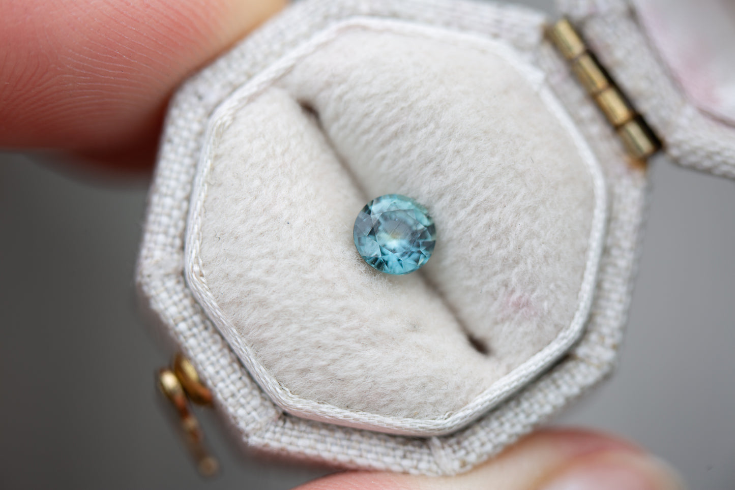 .62ct round blue green sapphire
