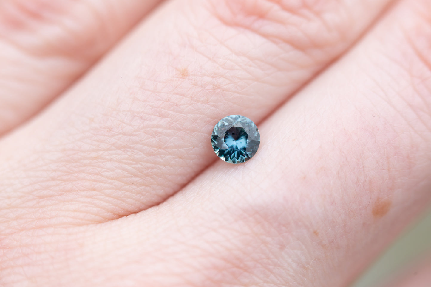 .5ct round blue teal sapphire