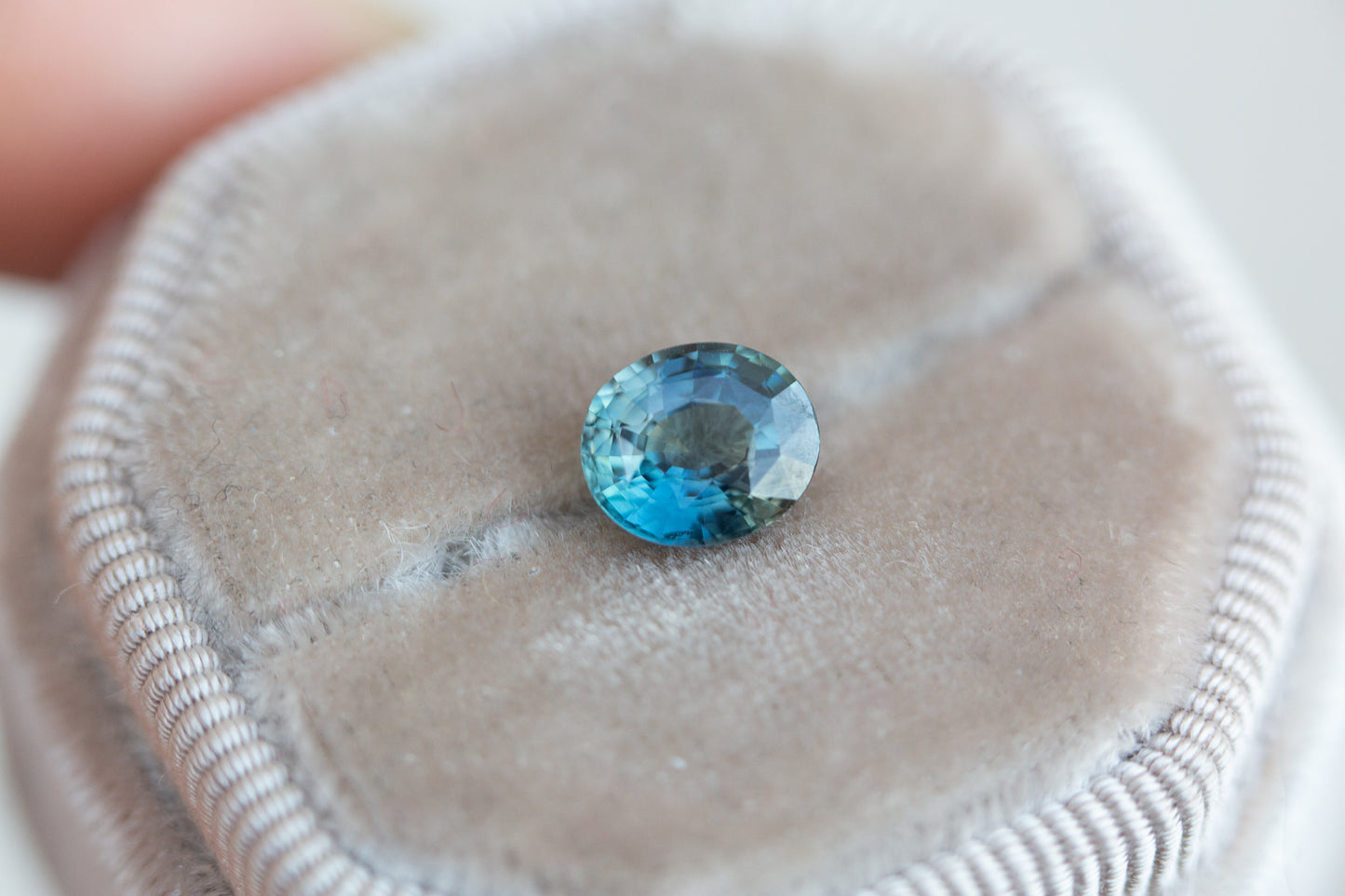 2.12ct oval indigo/teal sapphire