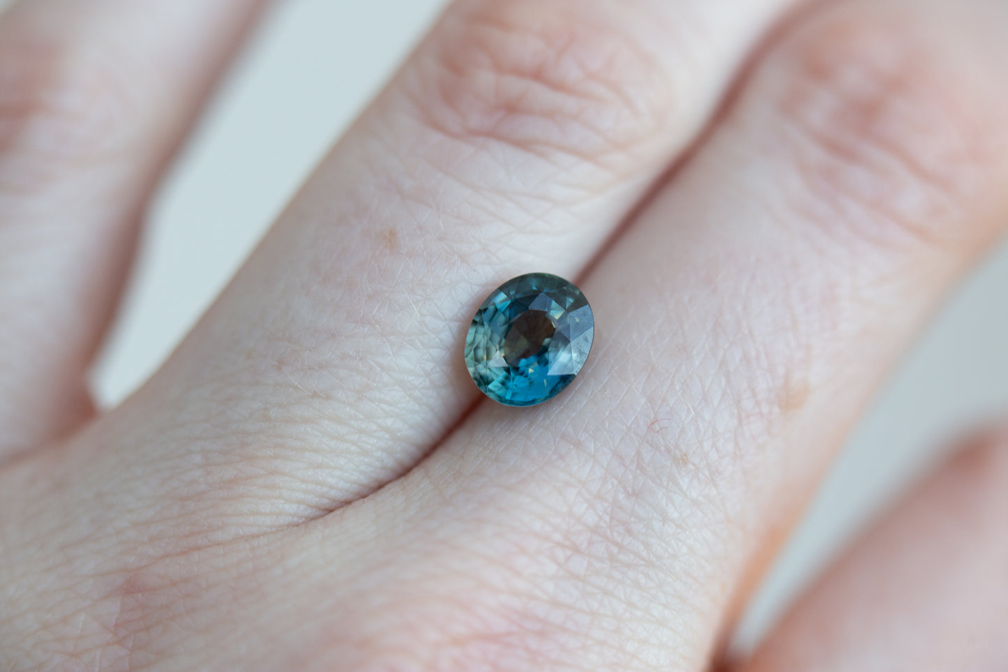 2.12ct oval indigo/teal sapphire