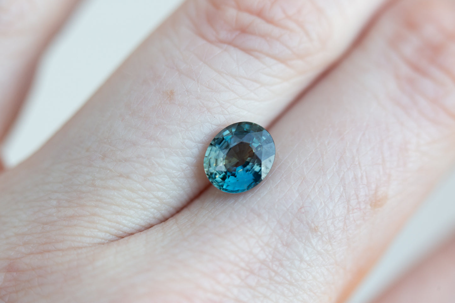 2.12ct oval indigo/teal sapphire