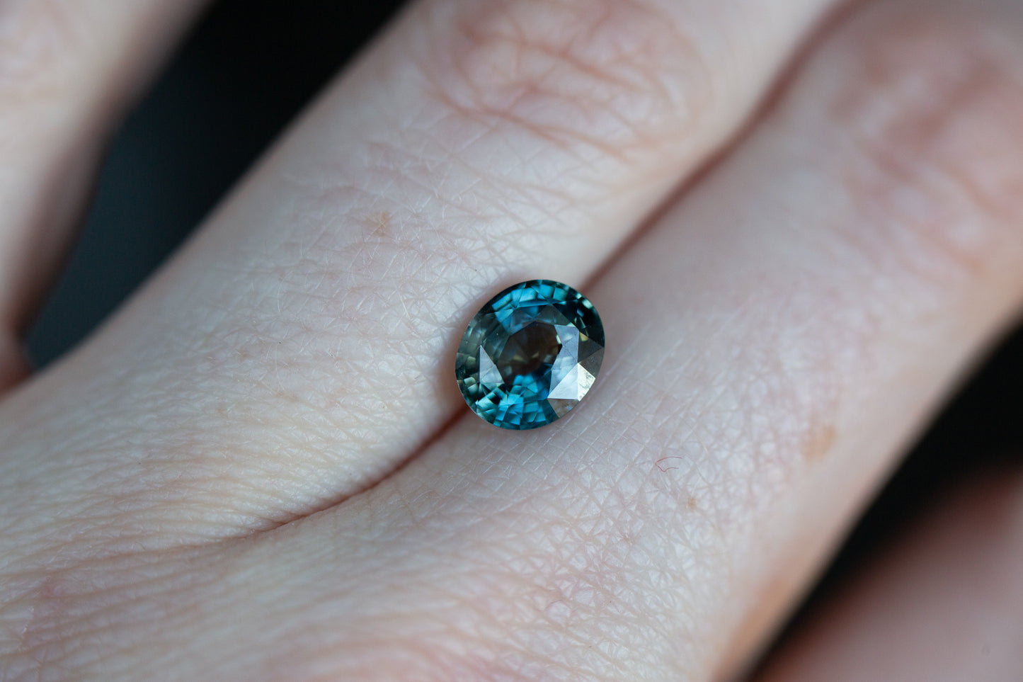 2.12ct oval indigo/teal sapphire