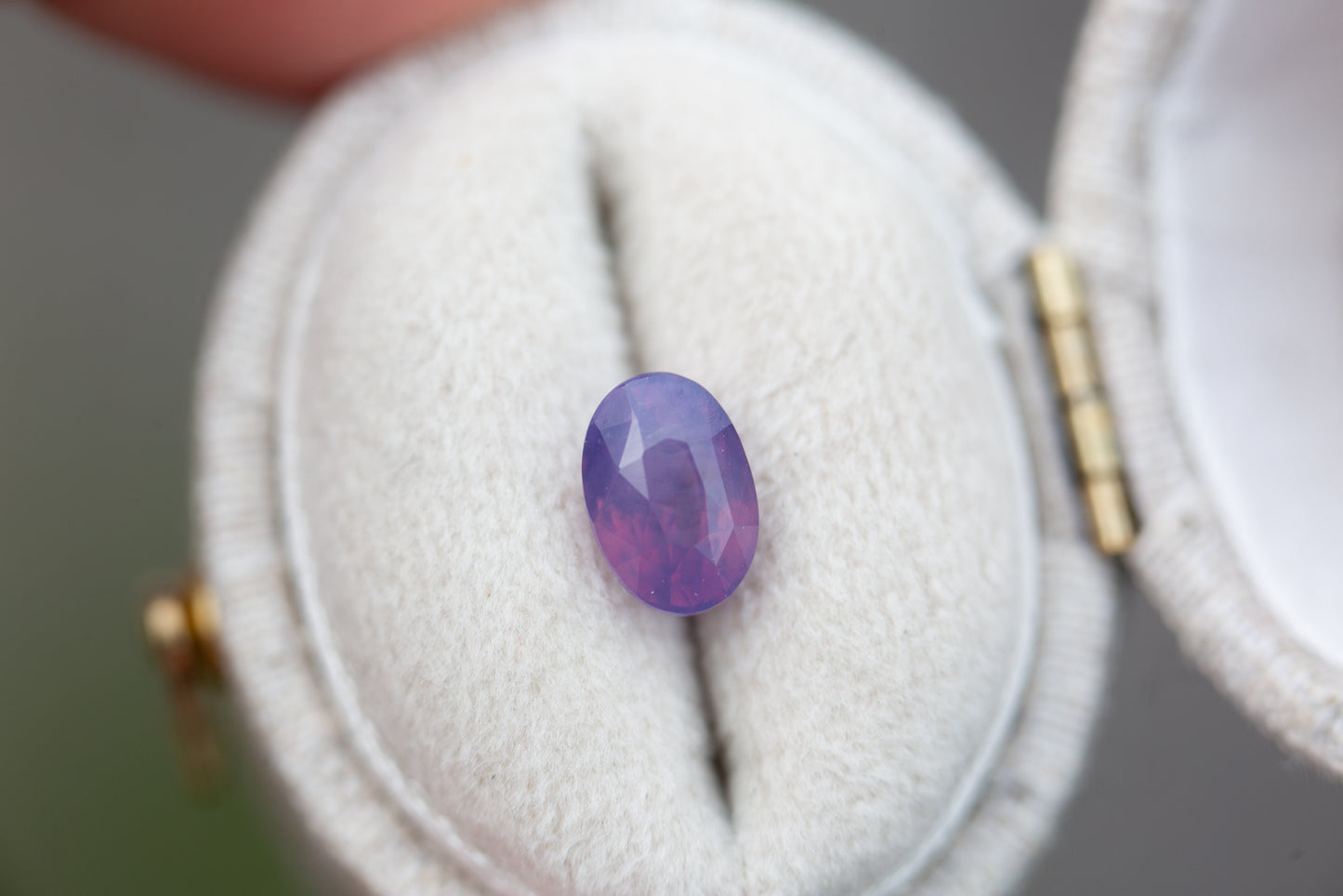 ON HOLD 1.52ct oval opalescent purple sapphire
