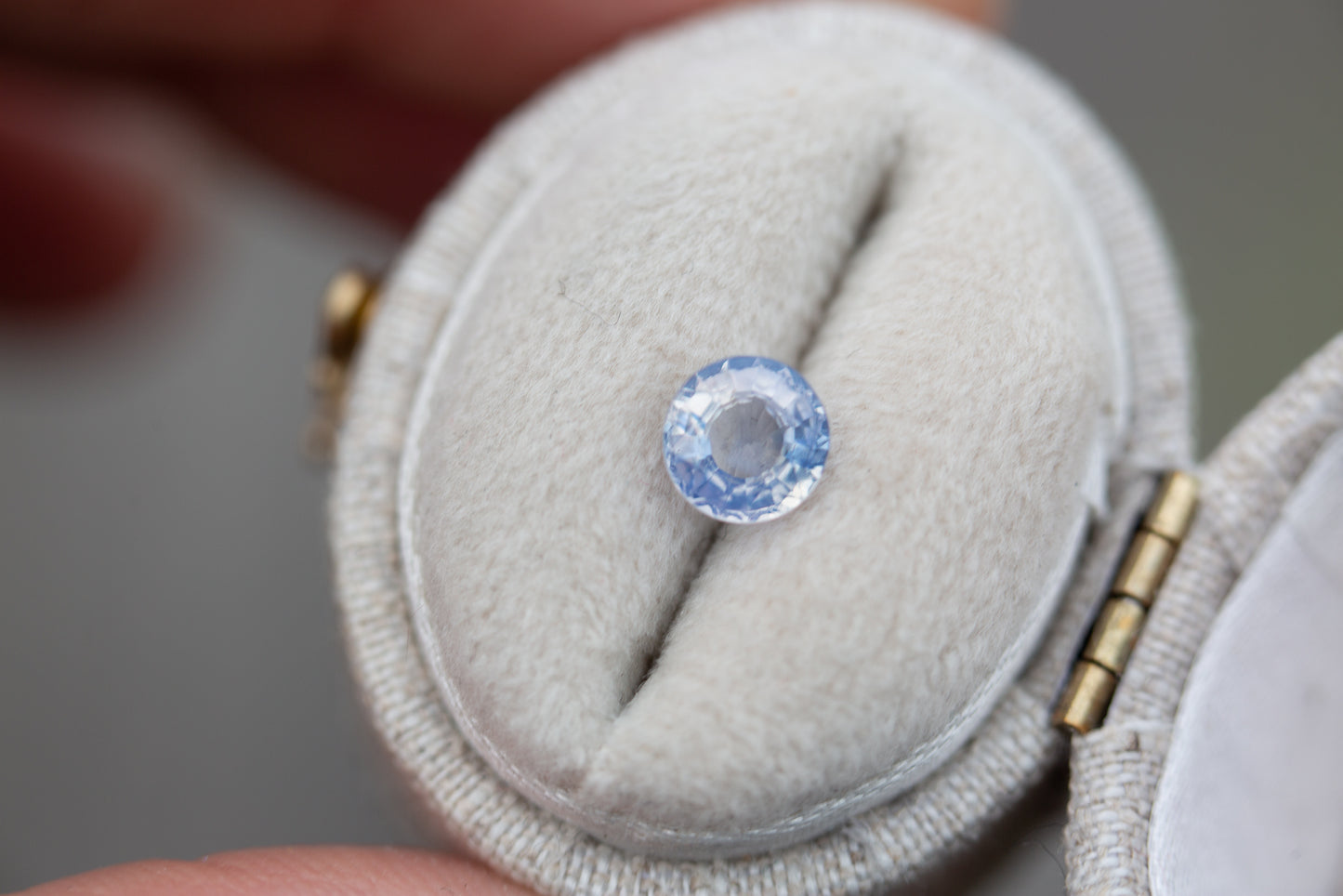 .72ct round opalescent blue white sapphire