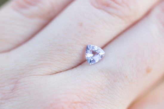 Load image into Gallery viewer, .86ct trillion cut lavender sapphire
