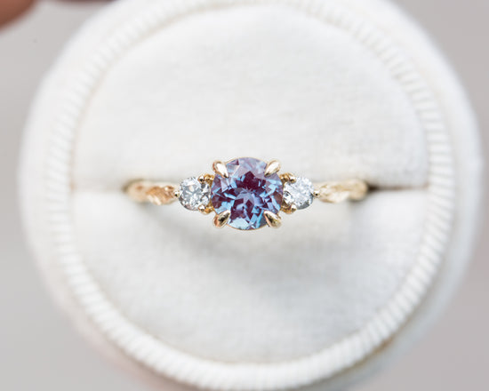 Round alexandrite and grey diamond leaf engagement ring