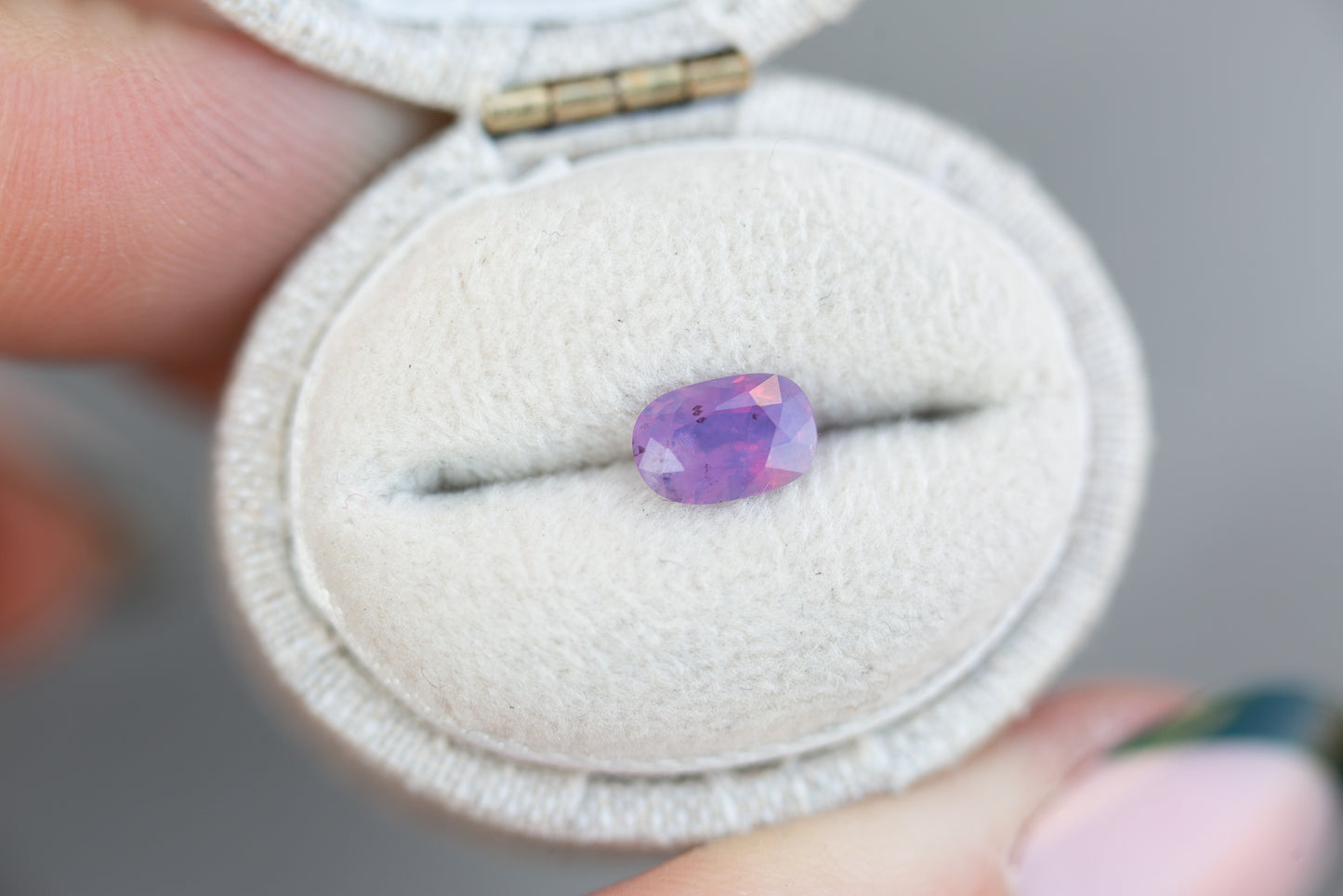 Load image into Gallery viewer, .84ct oval opalescent purple pink sapphire
