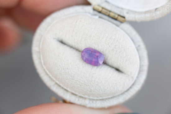 Load image into Gallery viewer, .84ct oval opalescent purple pink sapphire
