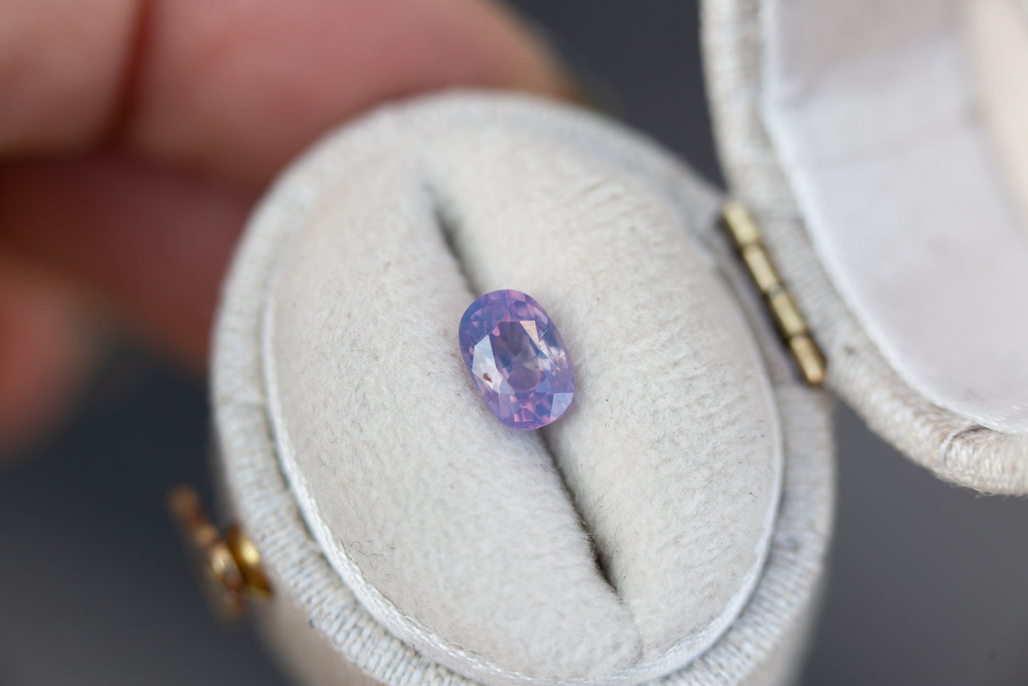 Load image into Gallery viewer, .97ct oval opalescent purple pink sapphire
