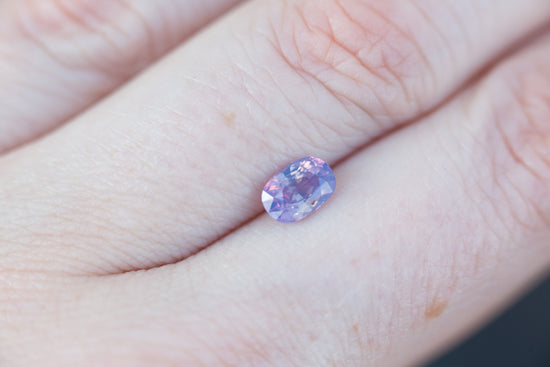 Load image into Gallery viewer, .97ct oval opalescent purple pink sapphire
