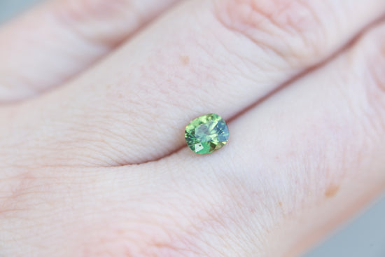 Load image into Gallery viewer, .76ct cushion cut green sapphire
