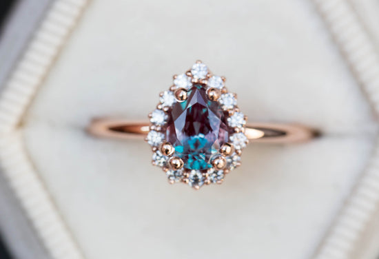 Pear alexandrite halo engagement ring