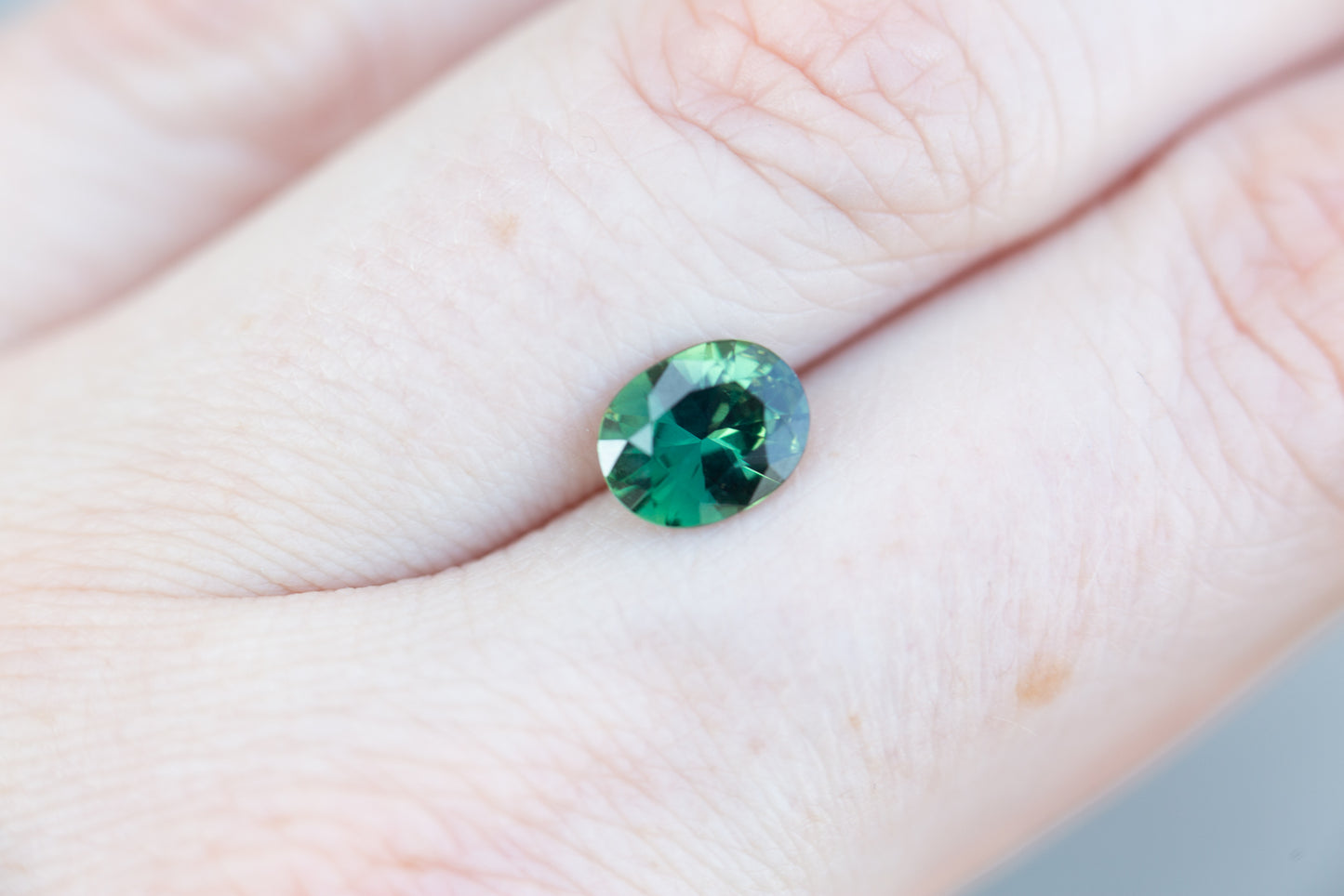 1.51ct oval deep green sapphire
